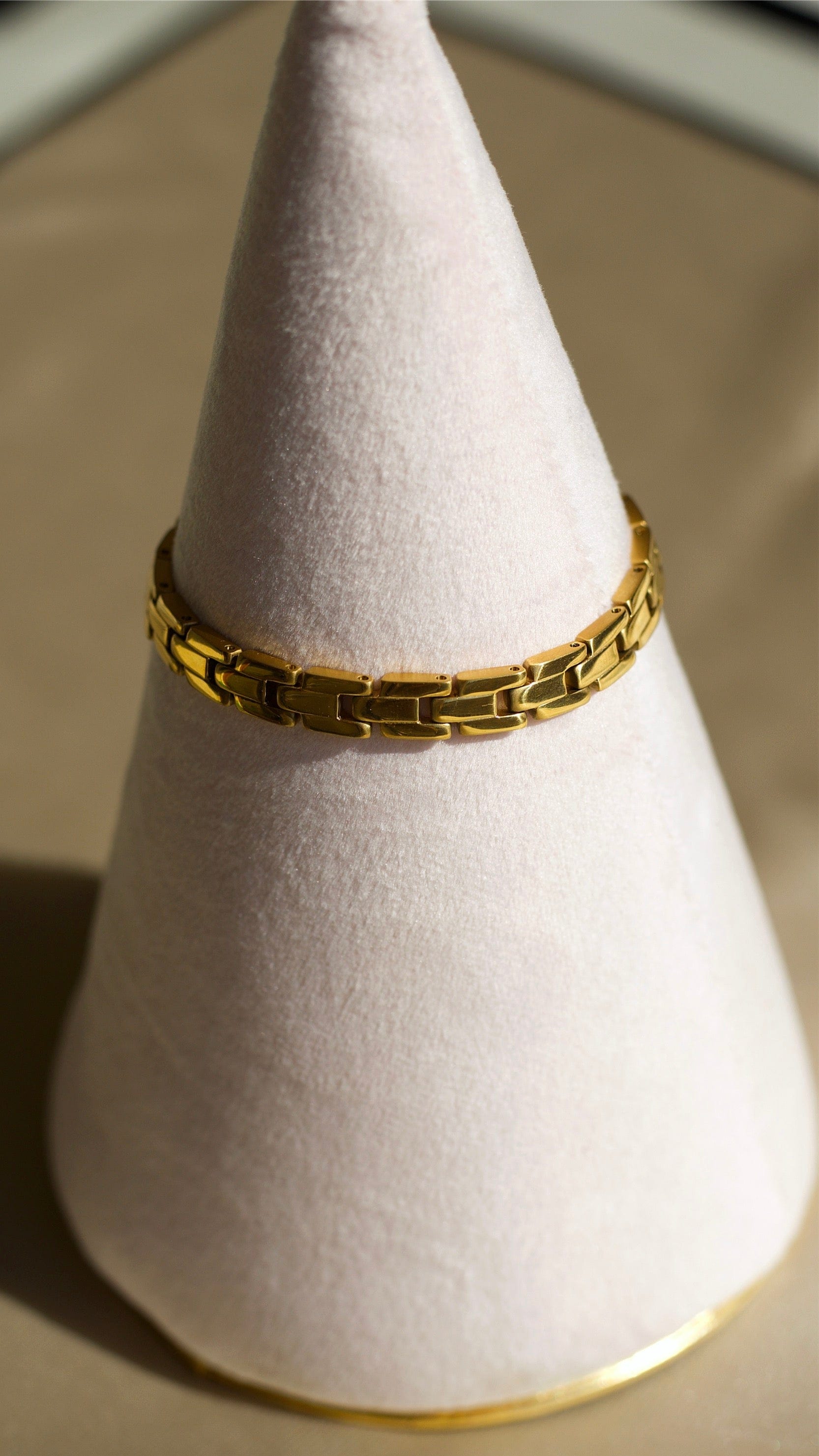 Aubree Panther Link Bracelet featuring chunky gold and silver links, showcasing its elegant design and durable materials.