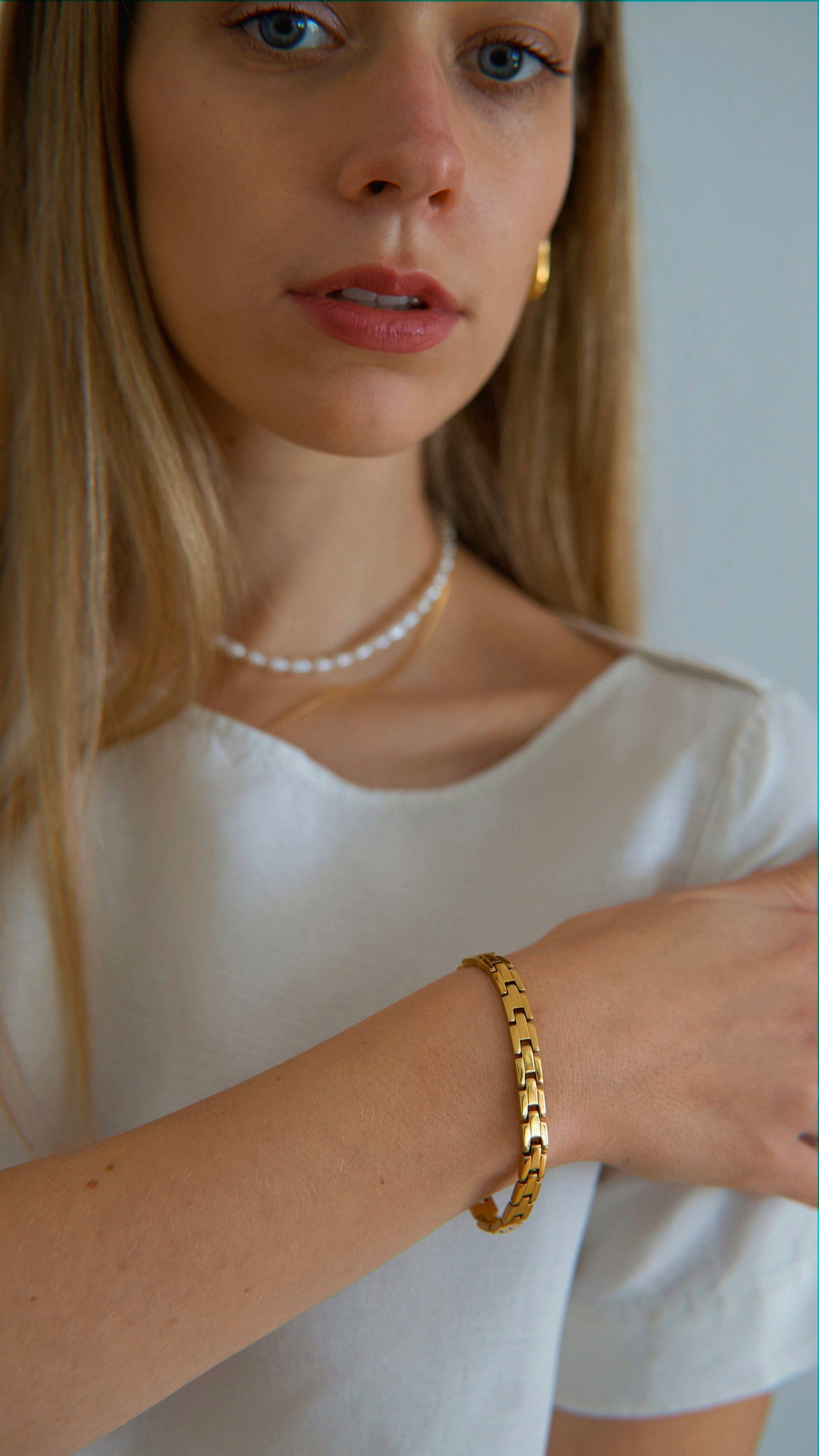 Aubree Panther Link Bracelet featuring chunky gold and silver links, showcasing its elegant design and durable materials.