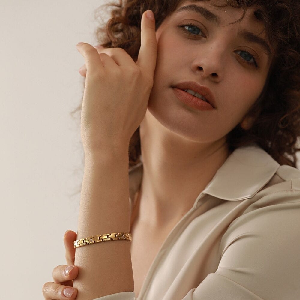 Aubree Panther Link Bracelet featuring chunky gold and silver links, showcasing its elegant design and durable materials.