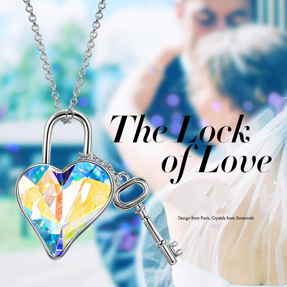 Aurora Borealis The Key To My Heart Pendant Necklace featuring a heart-shaped AAAAA crystal on a 14K white gold plated link chain.