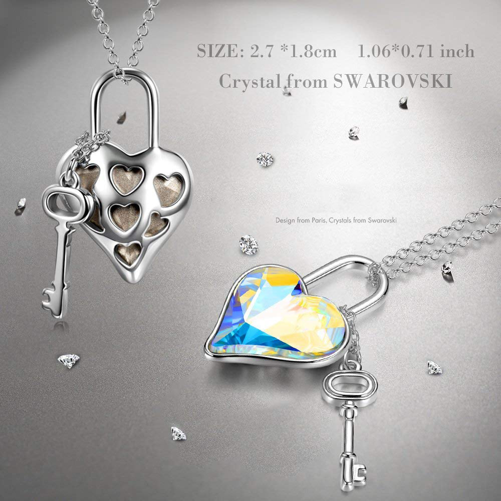 Aurora Borealis The Key To My Heart Pendant Necklace featuring a heart-shaped AAAAA crystal on a 14K white gold plated link chain.