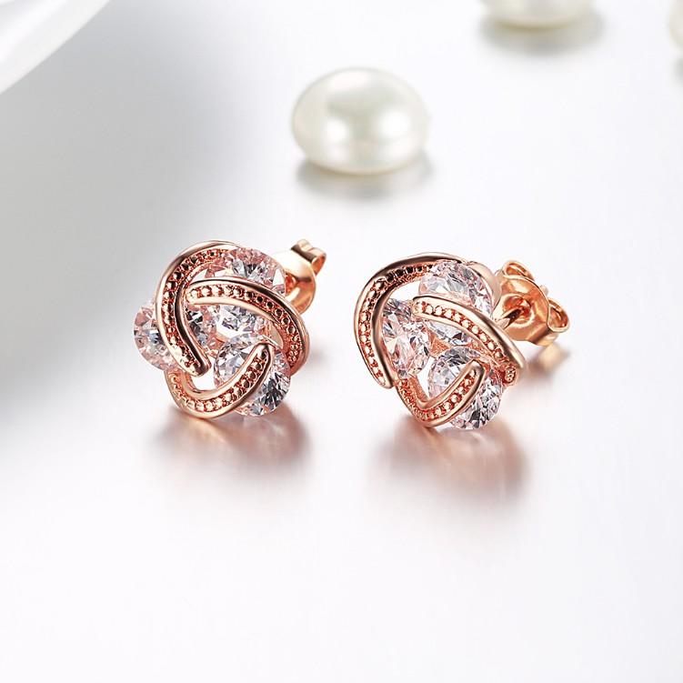 Austrian Crystal Knot Stud Earrings set in rose gold, featuring a delicate knot design and butterfly backing for secure wear.