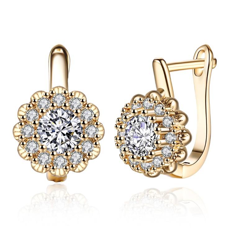 Austrian Crystal Micro Pav'e Bursting Star Leverback Earrings featuring 18K gold plating and a sparkling design.