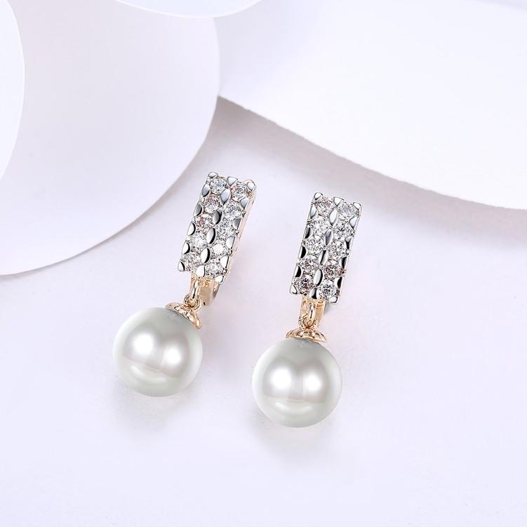 A pair of elegant Austrian Crystal Square Shaped Pearl Leverback Earrings set in 18K gold, showcasing their luxurious design and sparkling crystals.