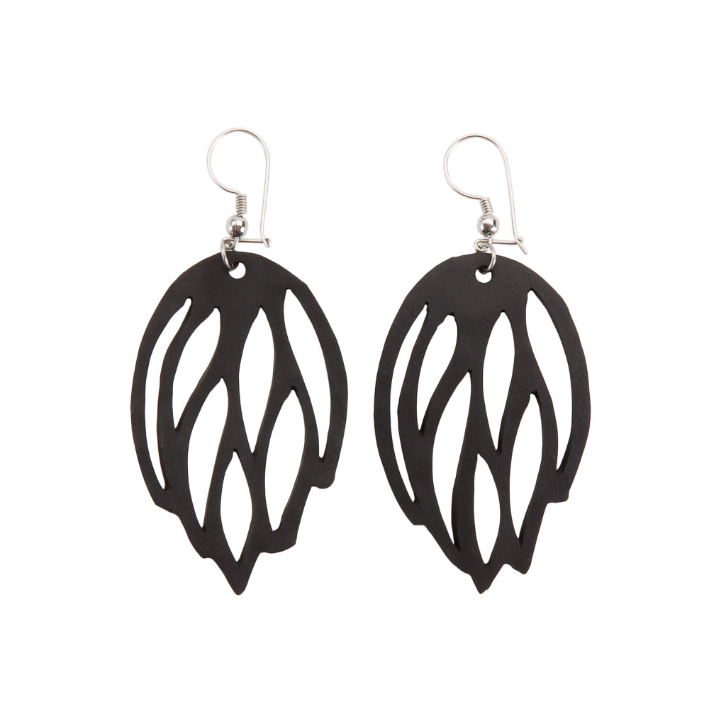 A pair of Autumn Recycled Rubber Earrings, handcrafted from reclaimed tyre inner tubes, featuring unique textures and a design inspired by autumn leaves.