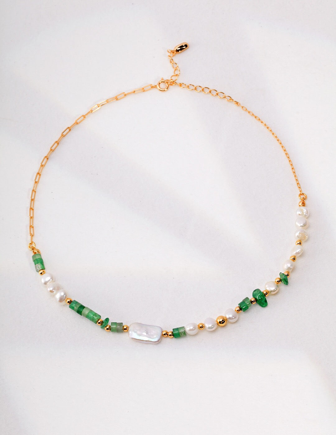 A stunning Aventurine Beads with Pearl Necklace featuring natural pearls and gold vermeil accents, elegantly displayed on a soft background.