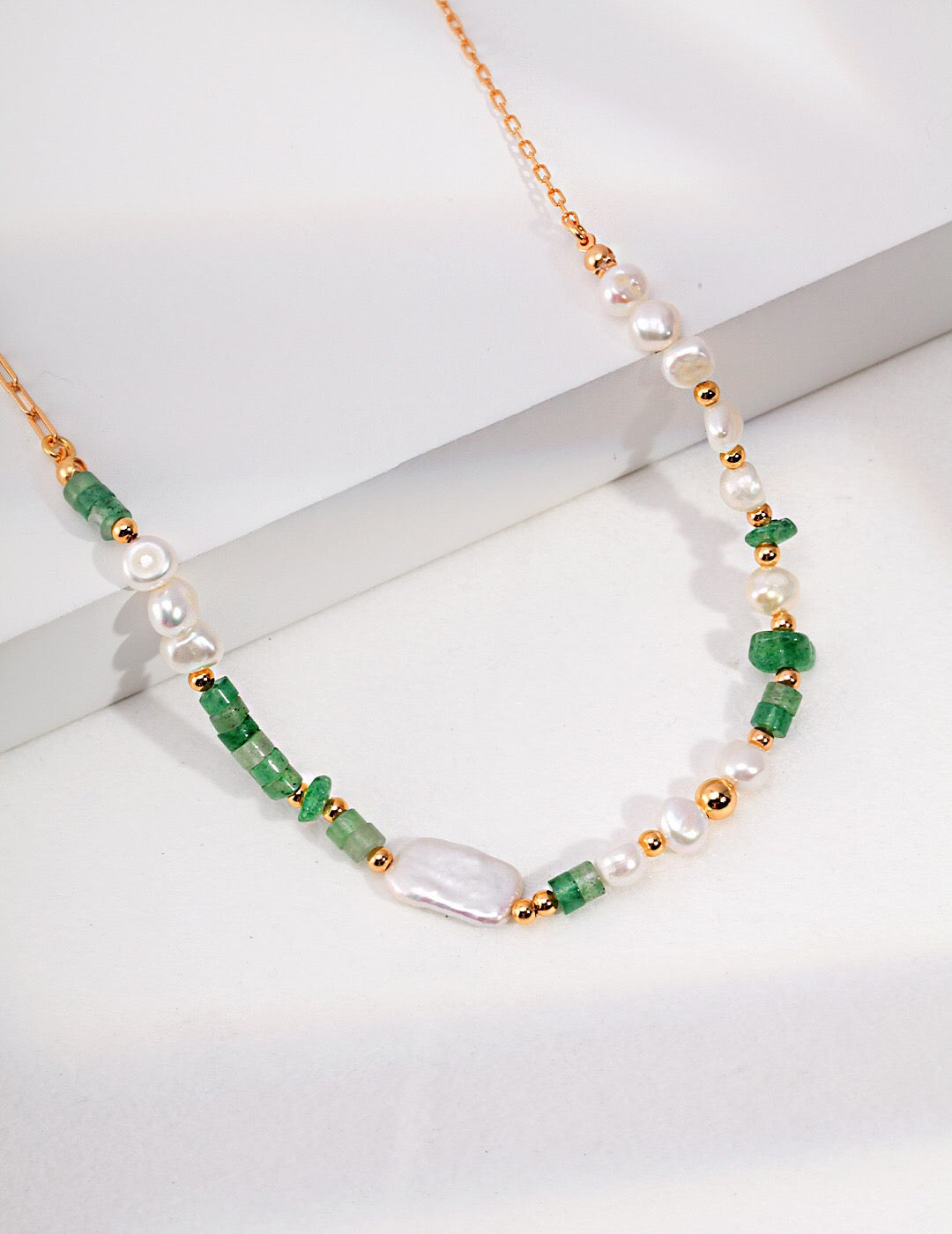 A stunning Aventurine Beads with Pearl Necklace featuring natural pearls and gold vermeil accents, elegantly displayed on a soft background.