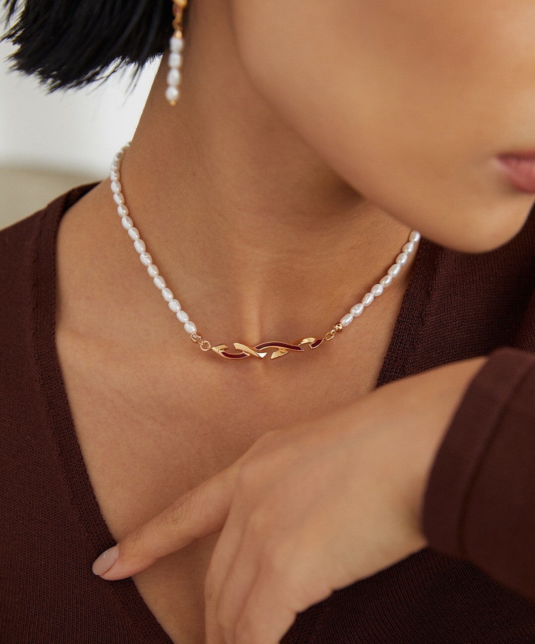 Awareness Ribbon Geometrical Necklace featuring natural pearls and sterling silver, elegantly designed for meaningful expression.