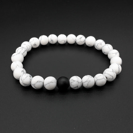 Ayokayishu Japanese Marble Chakra Bracelet featuring black and white marble stones on a stretchable brass chain, designed for men.