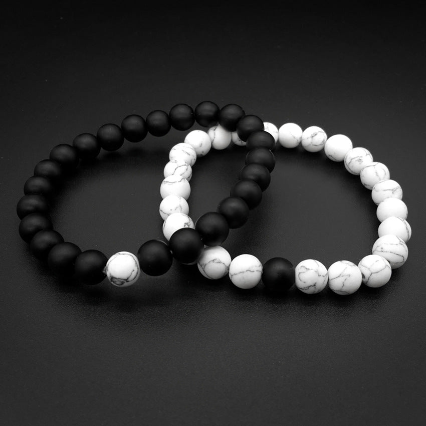 Ayokayishu Japanese Marble Chakra Bracelet featuring black and white marble stones on a stretchable brass chain, designed for men.