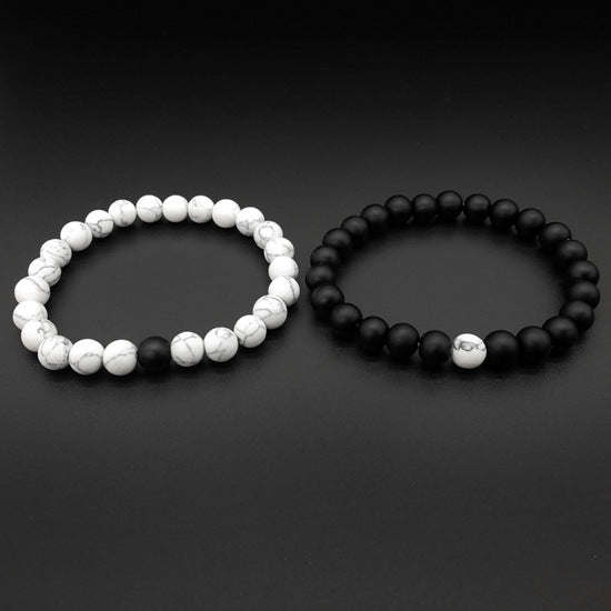 Ayokayishu Japanese Marble Chakra Bracelet featuring black and white marble stones on a stretchable brass chain, designed for men.