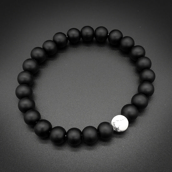 Ayokayishu Japanese Marble Chakra Bracelet featuring black and white marble stones on a stretchable brass chain, designed for men.