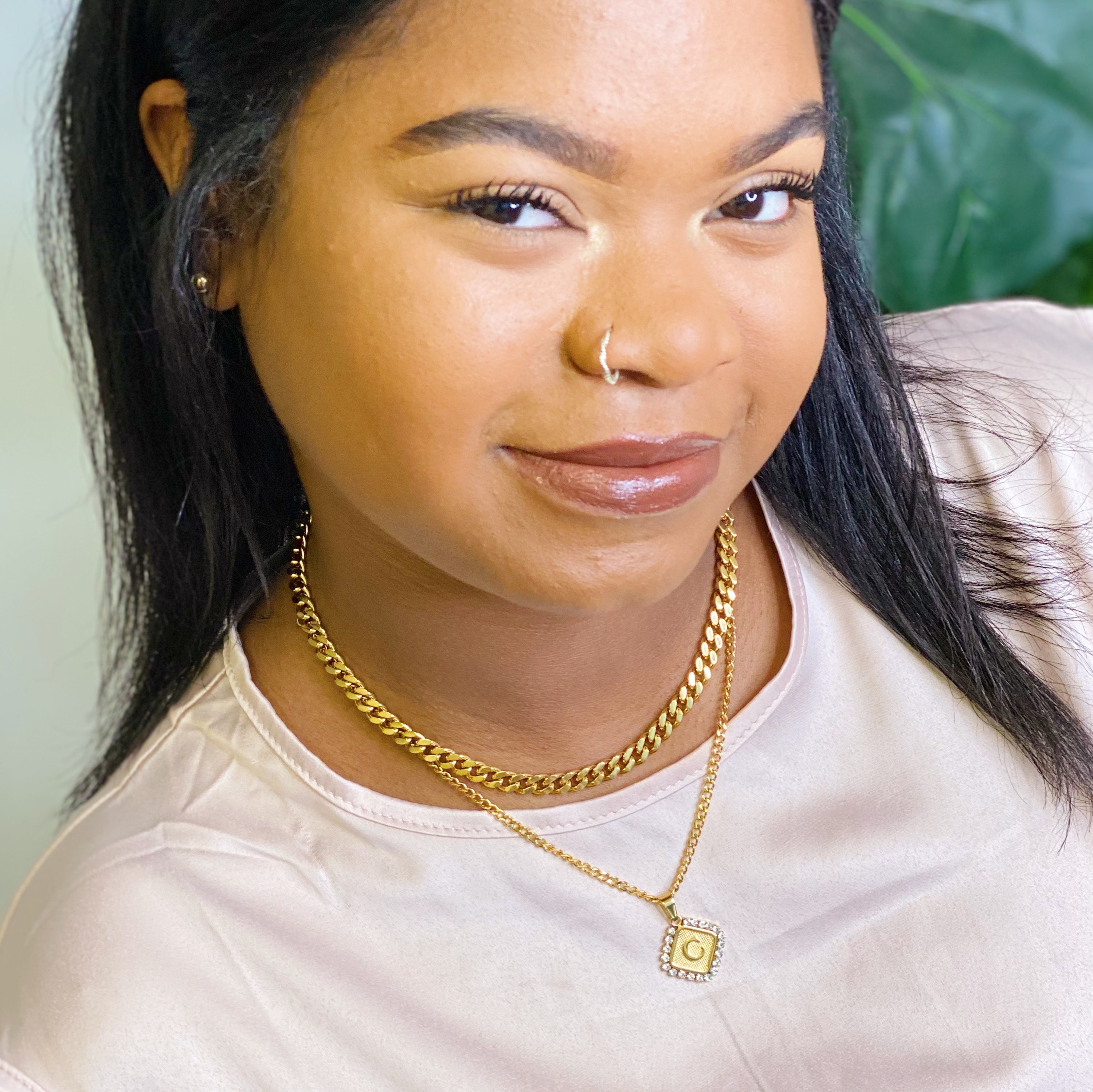 Aztec Delight Initial Necklace featuring a slim Cuban chain and a sparkling initial charm with Cubic Zirconia accents.