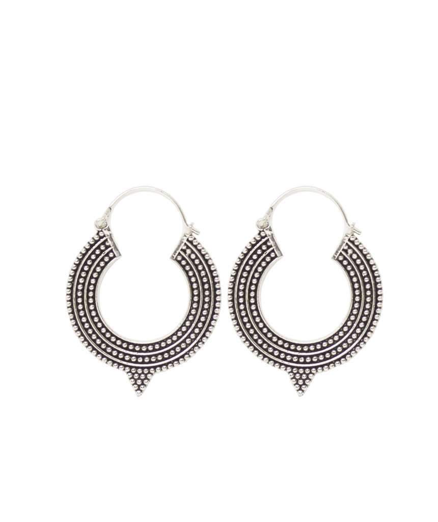 A pair of Aztec Hoop Earrings featuring intricate brass designs, available in three sizes, perfect for sensitive skin.