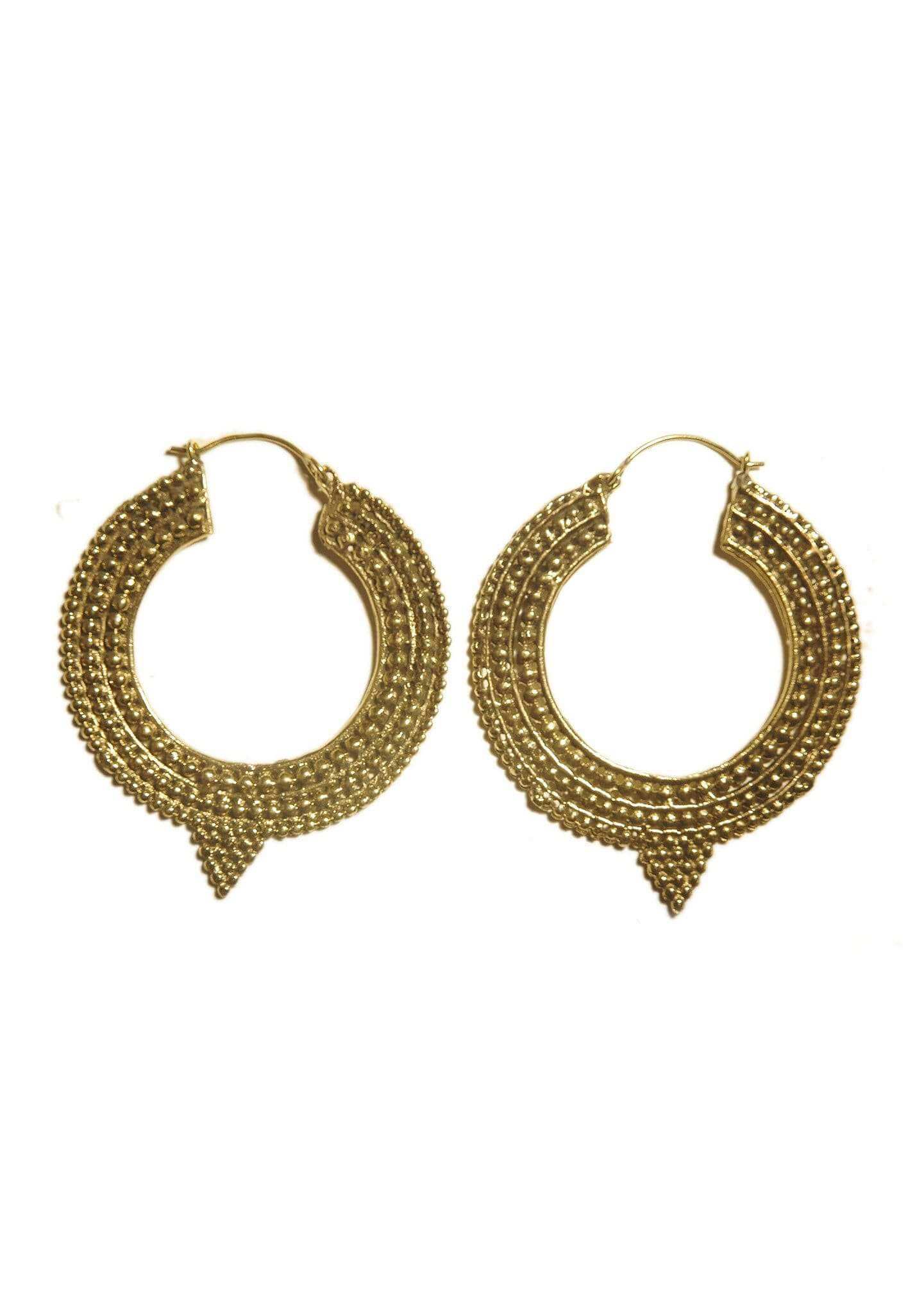 A pair of Aztec Hoop Earrings featuring intricate brass designs, available in three sizes, perfect for sensitive skin.