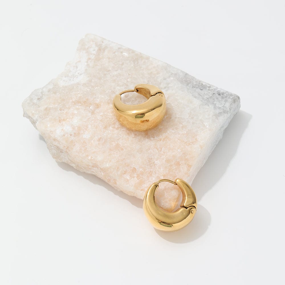 Baji Chunky Boat Polished Hoop Earrings in 18Kt yellow gold coating, showcasing a unique polished design.