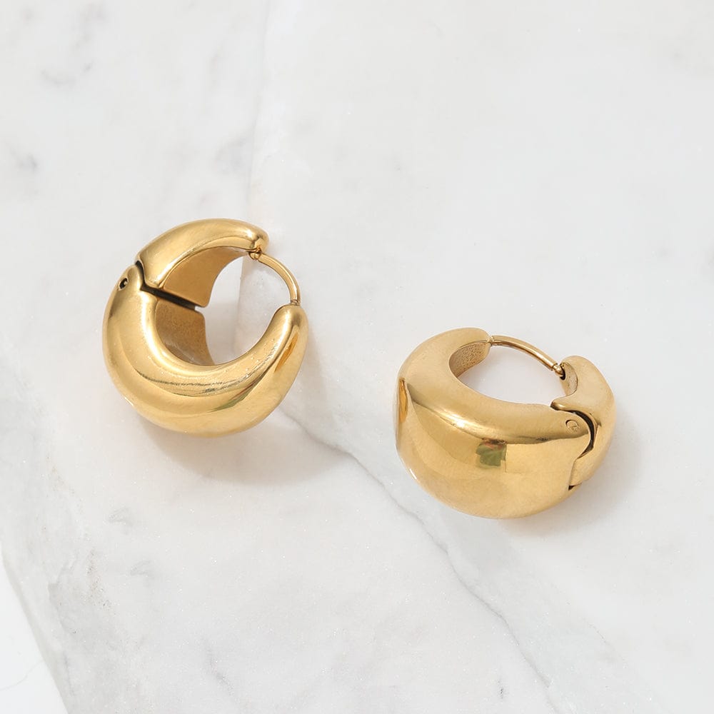 Baji Chunky Boat Polished Hoop Earrings in 18Kt yellow gold coating, showcasing a unique polished design.