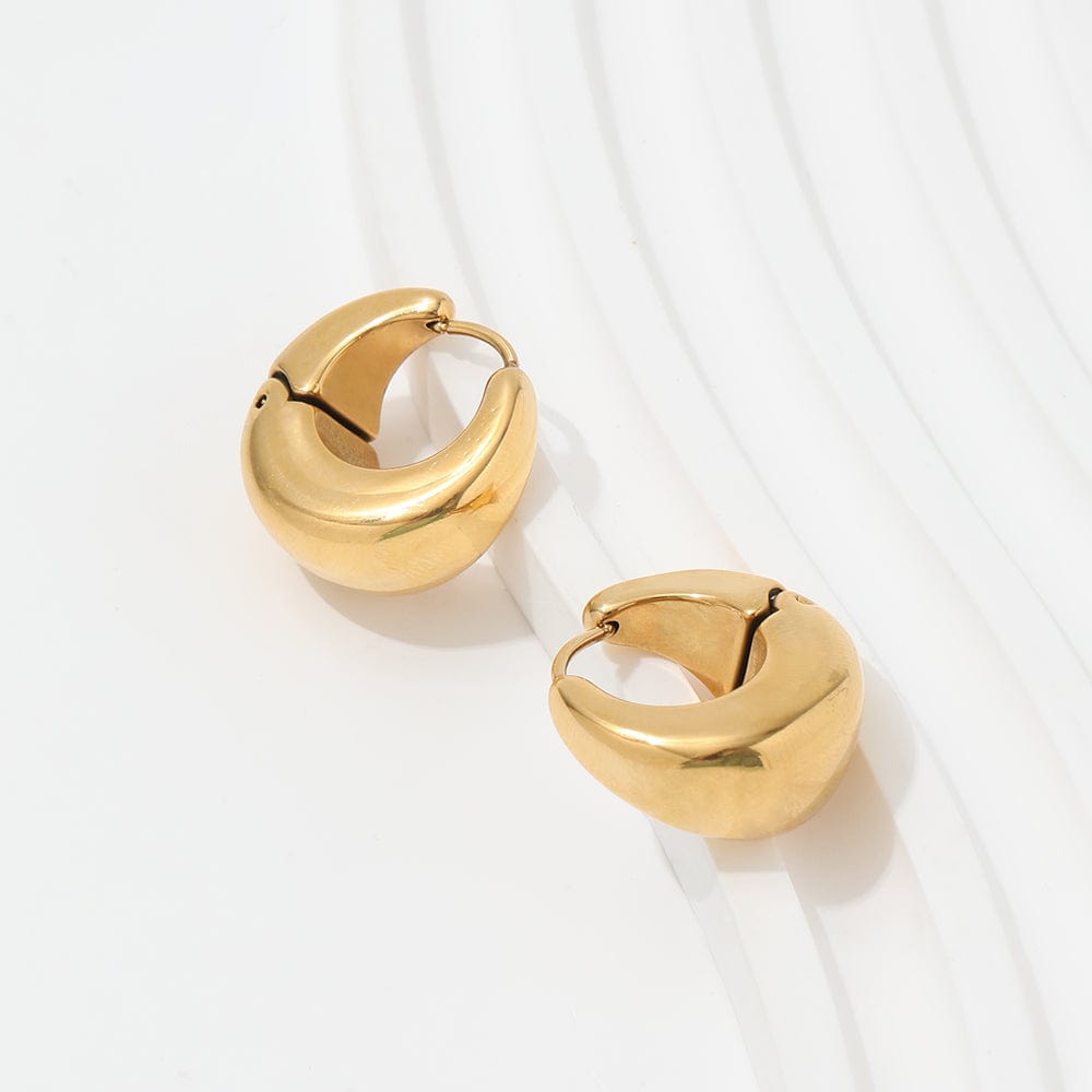 Baji Chunky Boat Polished Hoop Earrings in 18Kt yellow gold coating, showcasing a unique polished design.