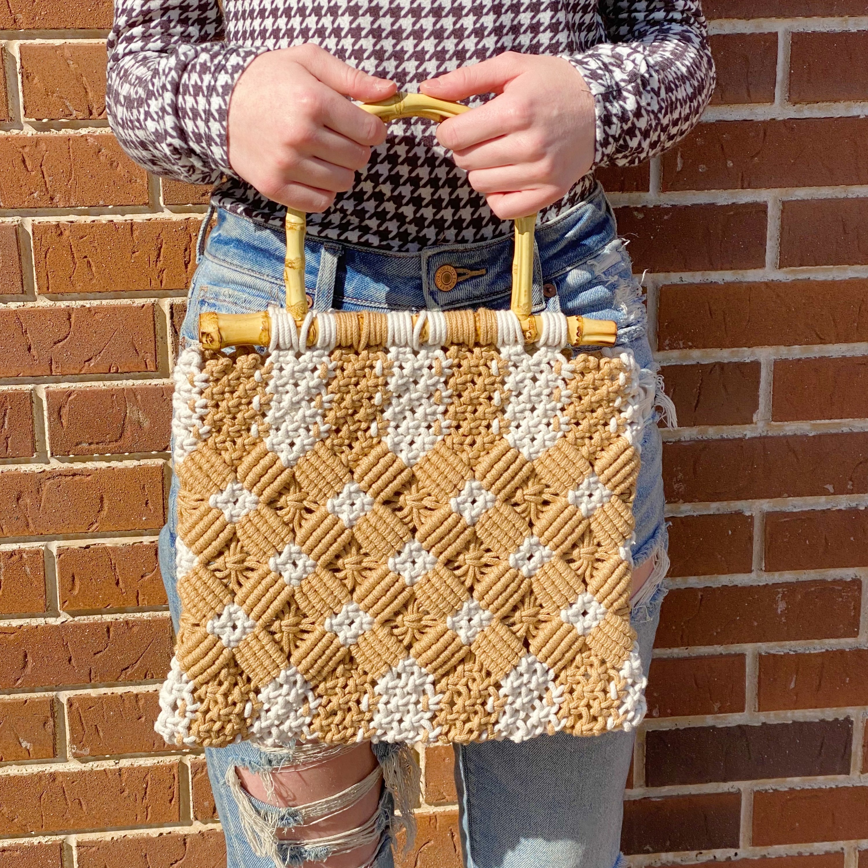 Bamboo Babe Tote featuring elegant bamboo handles and luxurious woven material in neutral colors.