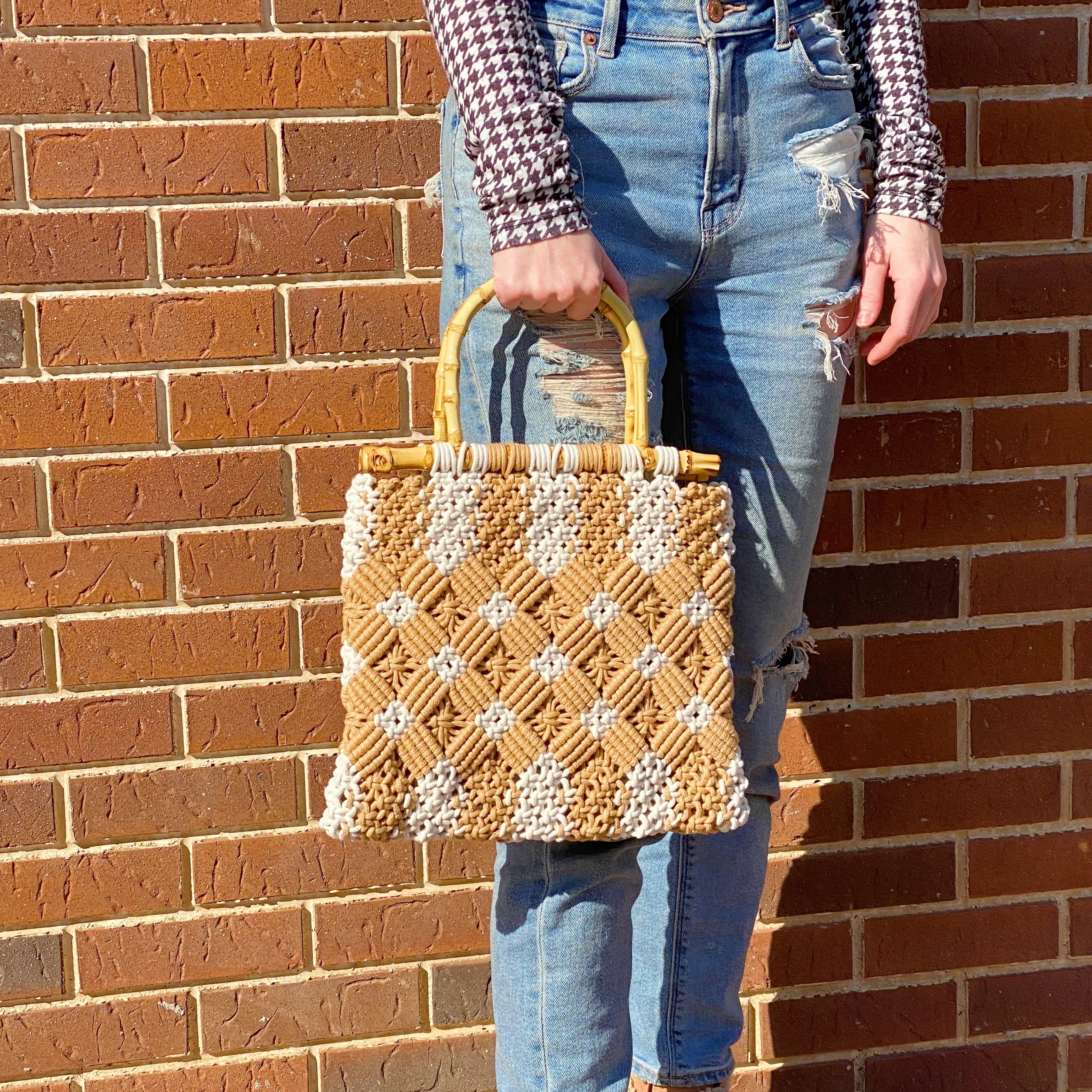 Bamboo Babe Tote featuring elegant bamboo handles and luxurious woven material in neutral colors.