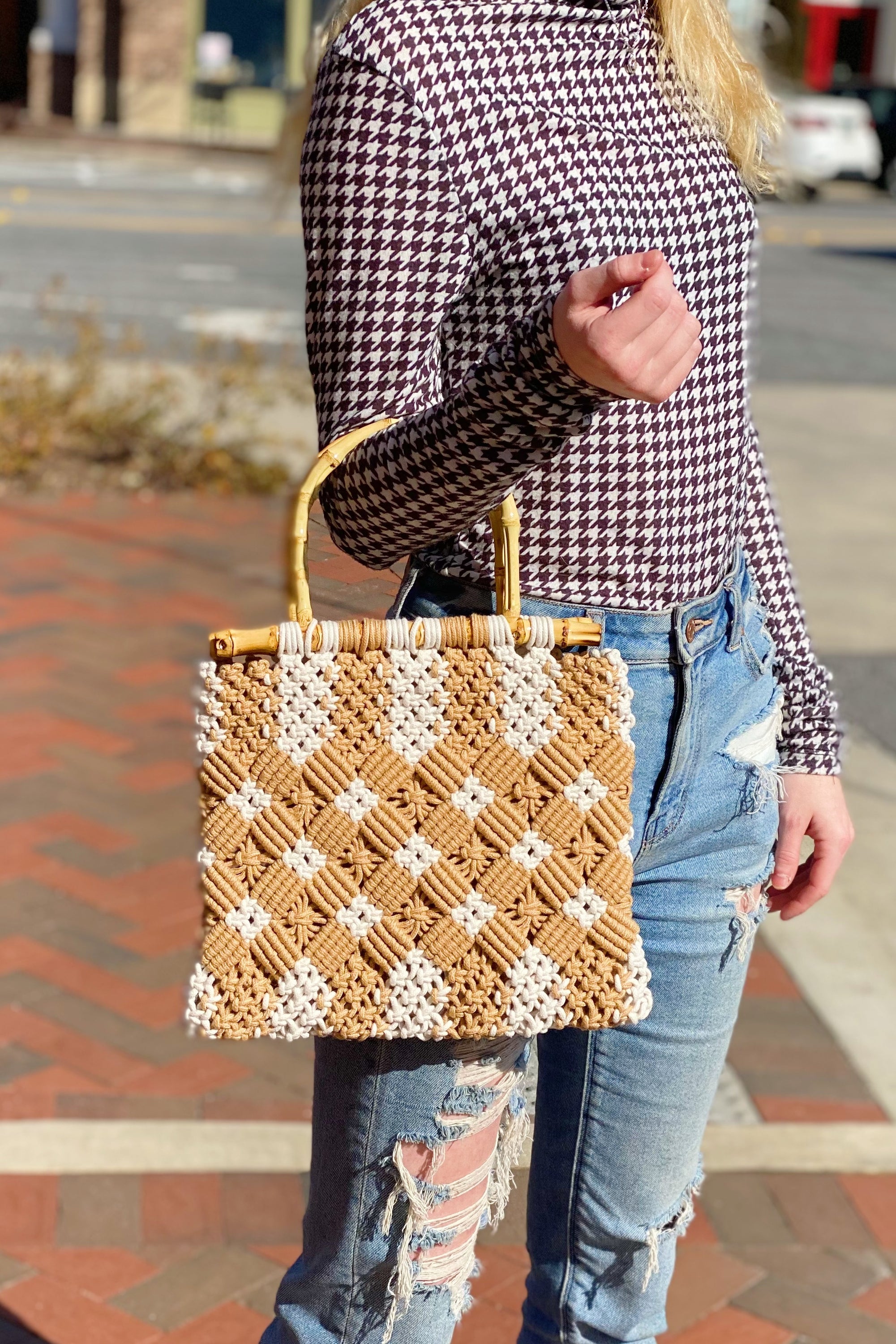 Bamboo Babe Tote featuring elegant bamboo handles and luxurious woven material in neutral colors.