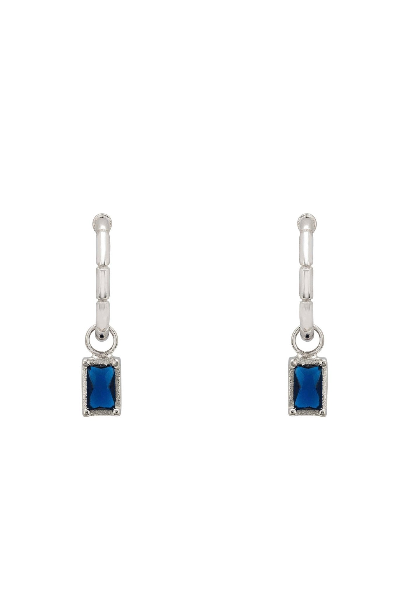 A pair of Bamboo Hoop Earrings made of sterling silver, featuring detachable rectangular lab-created sapphires, elegantly designed to resemble bamboo.