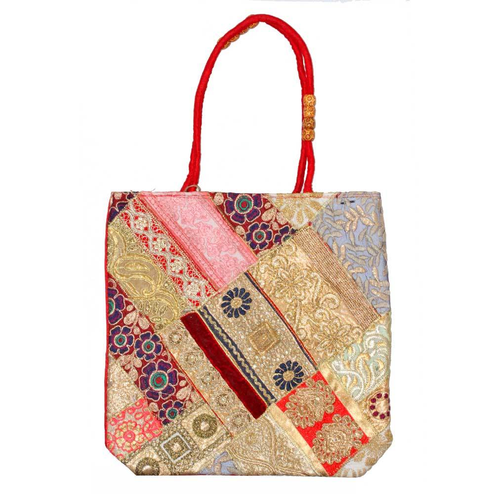 A beautifully crafted Banarasi raw silk tote bag featuring intricate patchwork, sequin, and zardozi embroidery, perfect for everyday use.