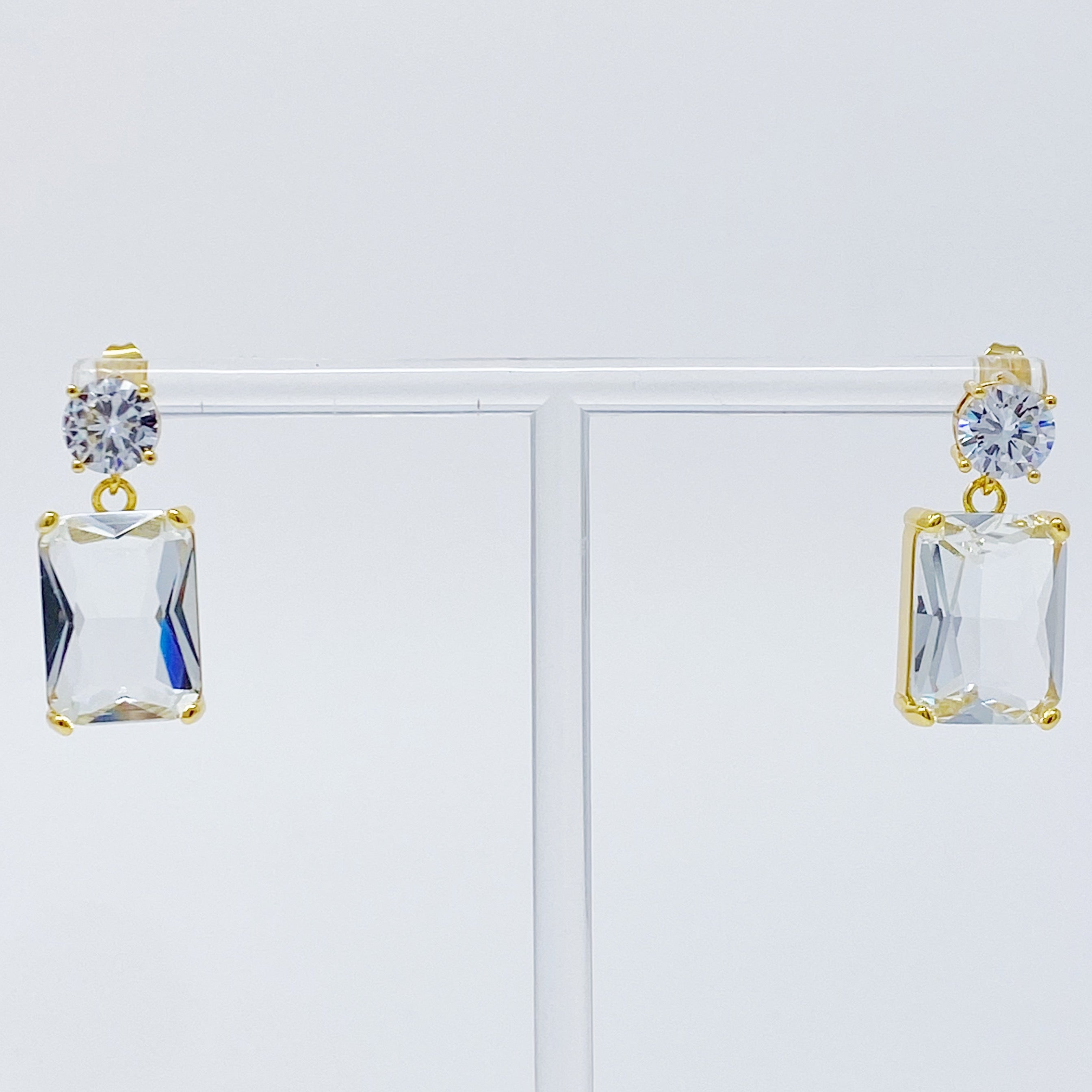 Elegant Banquet In Castle Jewel Earrings featuring baguette-cut jewels and round cubic zirconia, showcasing luxury and style.