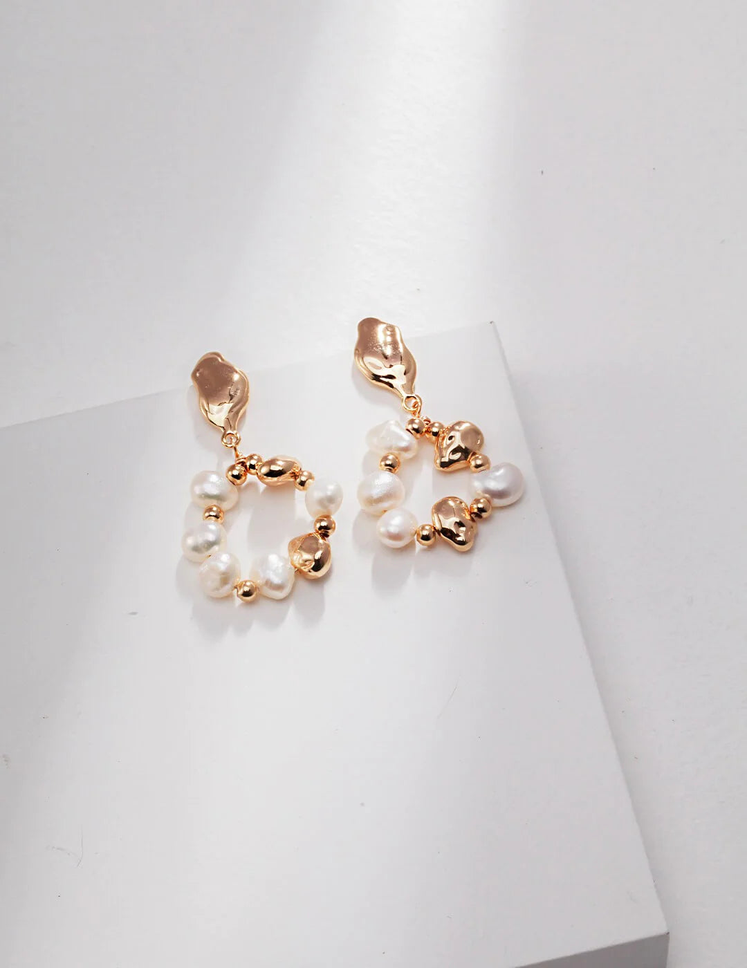 Elegant Baroque Pearl and Irregular Gold Ball Earrings, showcasing natural pearls and gold vermeil craftsmanship.