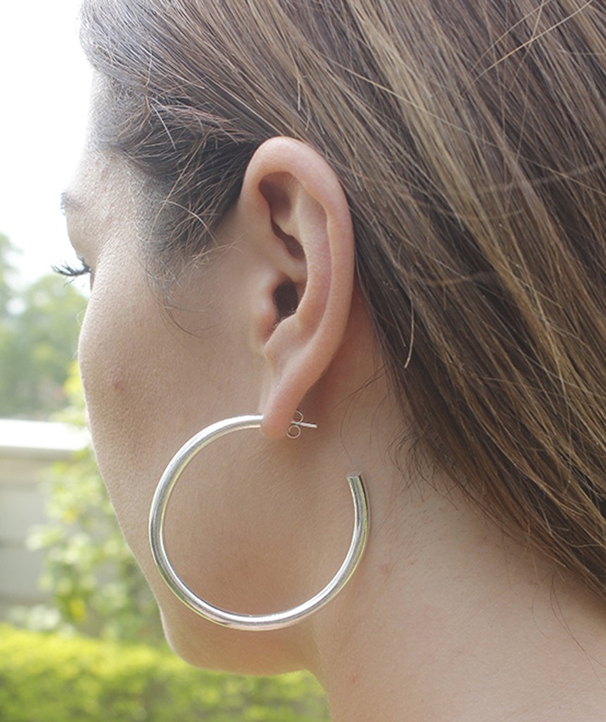 A pair of elegant Basic Semi-Open Hoop Earrings in gold and silver, showcasing their classic design and hypoallergenic features.