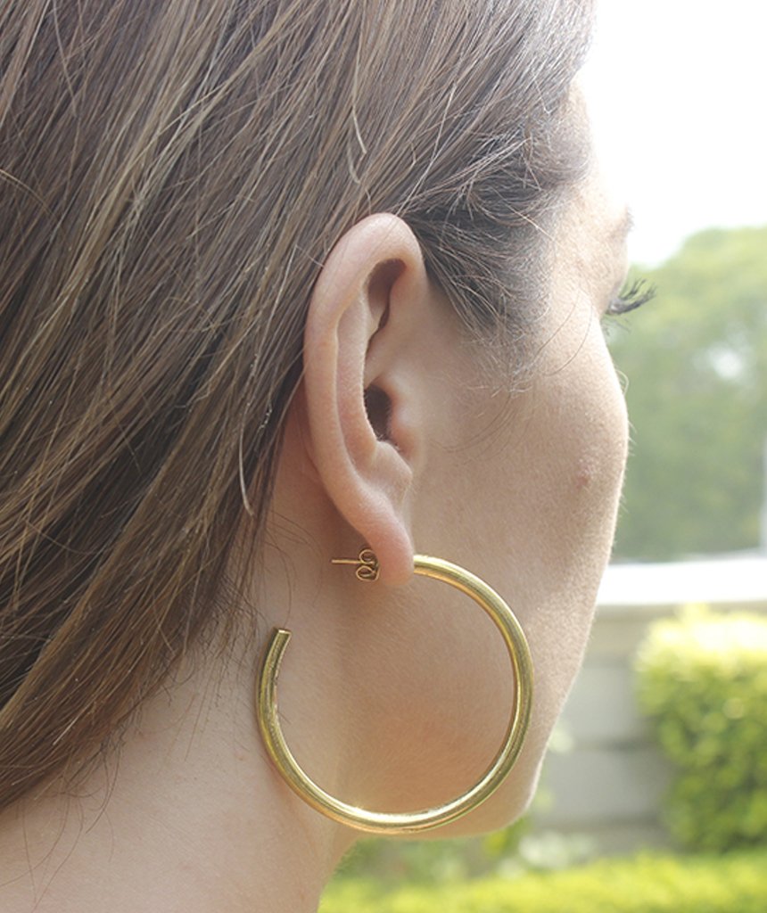 A pair of elegant Basic Semi-Open Hoop Earrings in gold and silver, showcasing their classic design and hypoallergenic features.