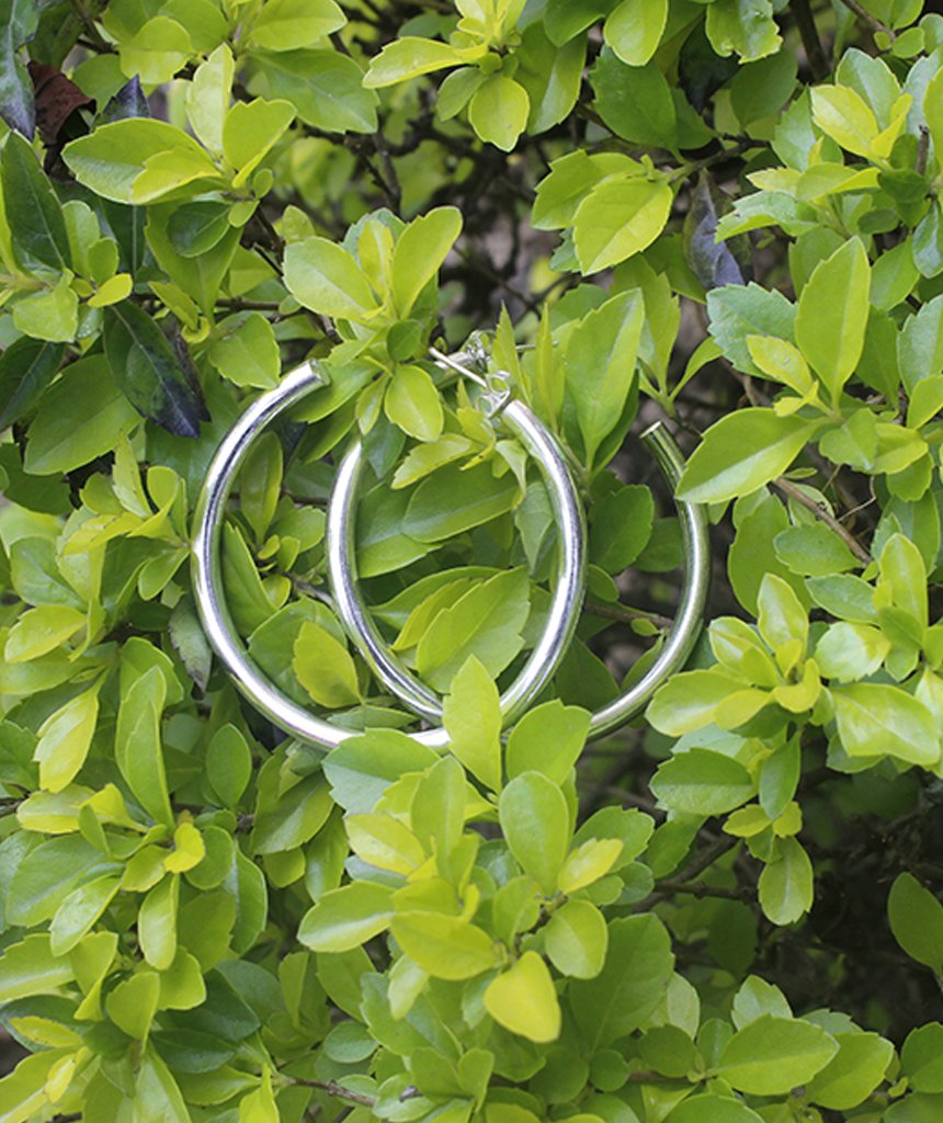 A pair of elegant Basic Semi-Open Hoop Earrings in gold and silver, showcasing their classic design and hypoallergenic features.