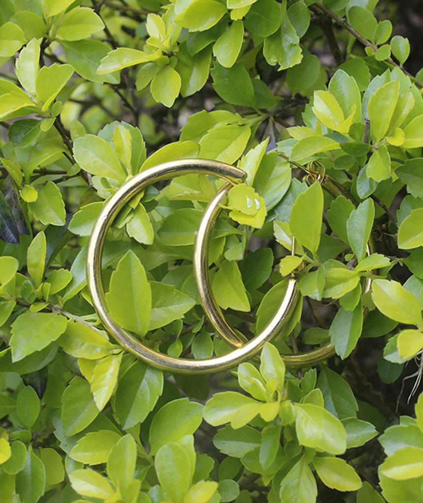 A pair of elegant Basic Semi-Open Hoop Earrings in gold and silver, showcasing their classic design and hypoallergenic features.