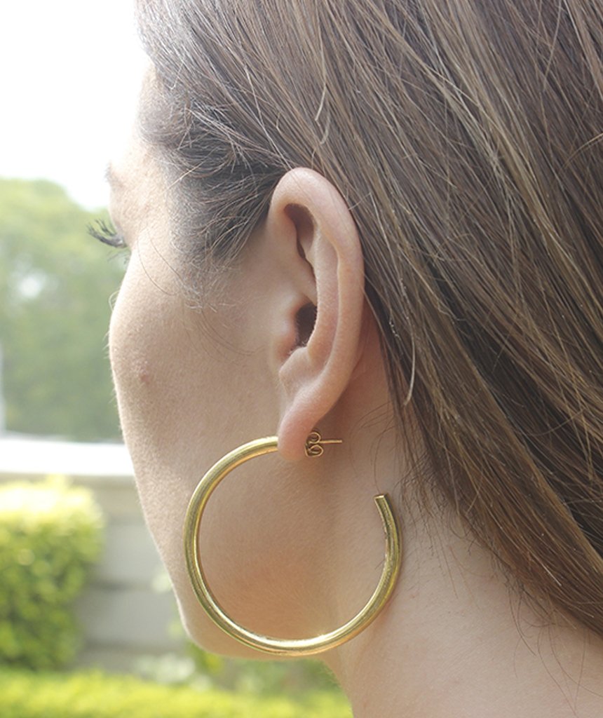 A pair of elegant Basic Semi-Open Hoop Earrings in gold and silver, showcasing their classic design and hypoallergenic features.