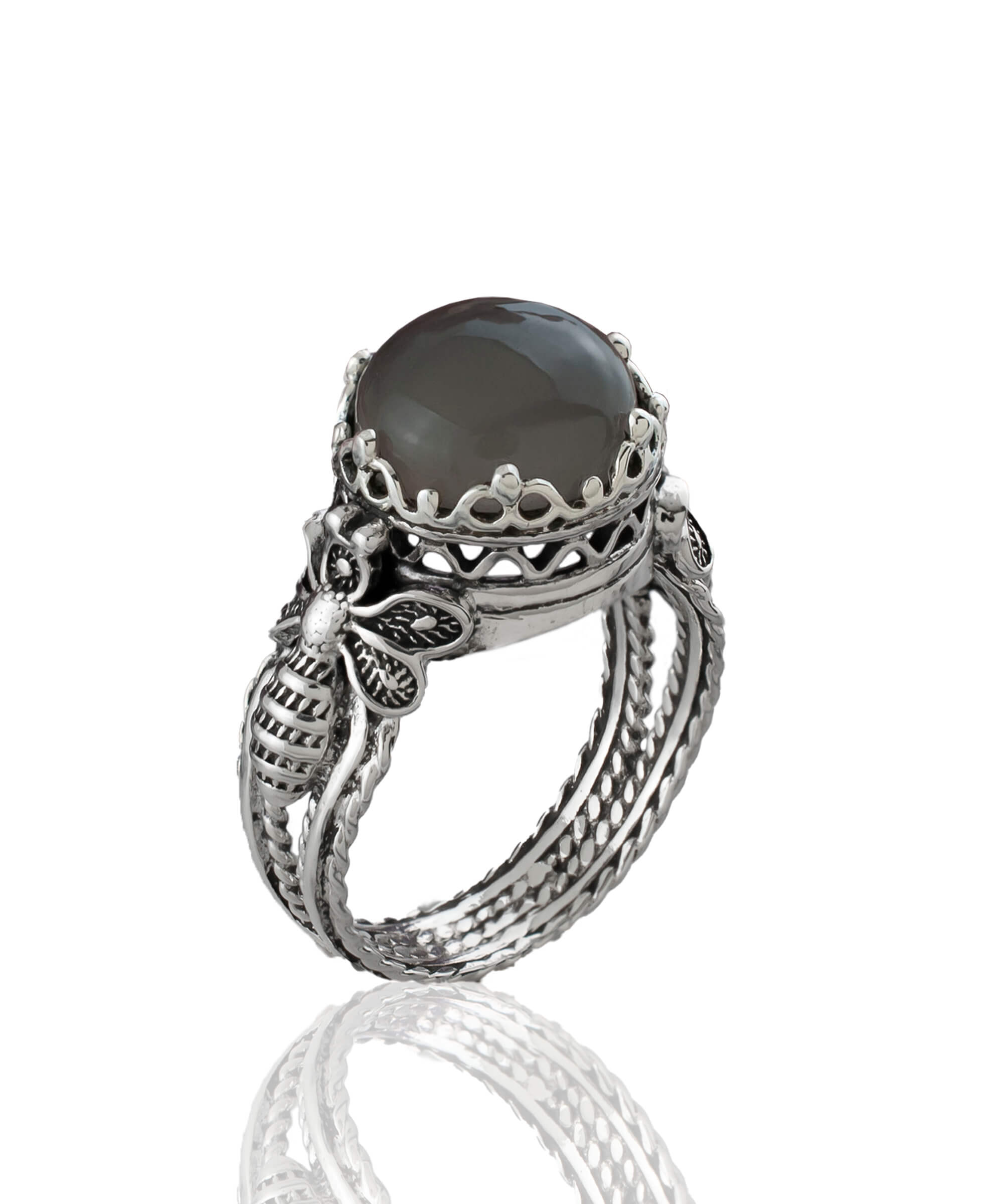 A beautiful sterling silver ring featuring a filigree bee design and a round gray moonstone gemstone, elegantly crafted for women.