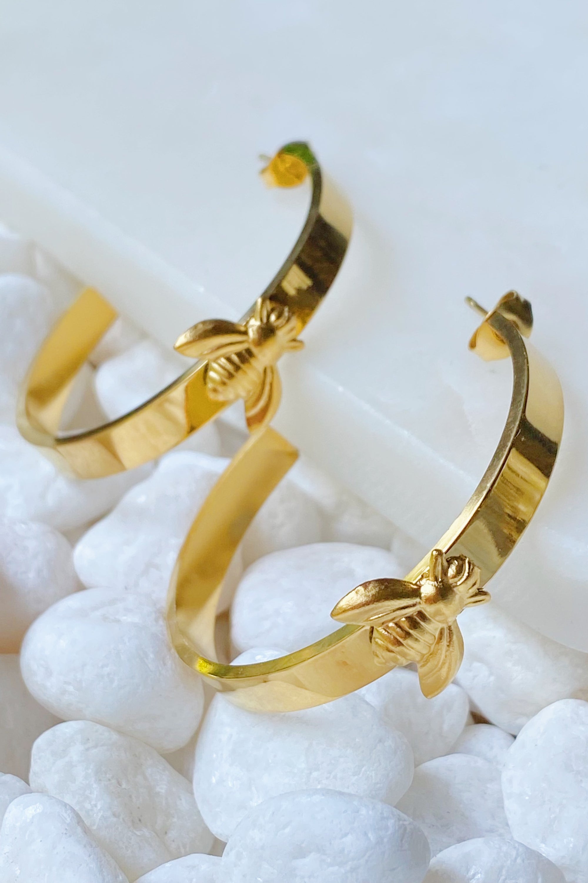 Elegant Bee Lovely Hoop Earrings featuring a bee accent, crafted from stainless steel and 18K gold plated.