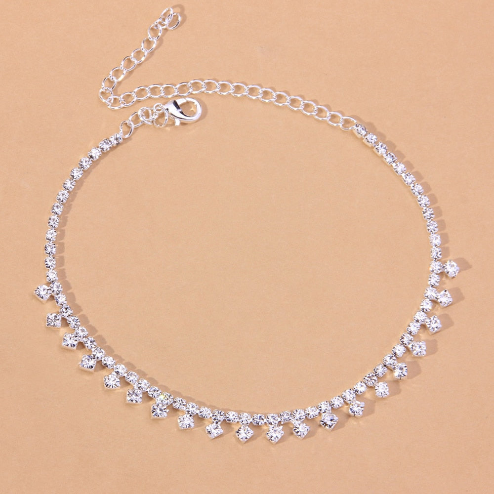 A stylish Beach Barefoot Chain Bracelet featuring zinc alloy and rhinestones, elegantly displayed in a jewelry box.