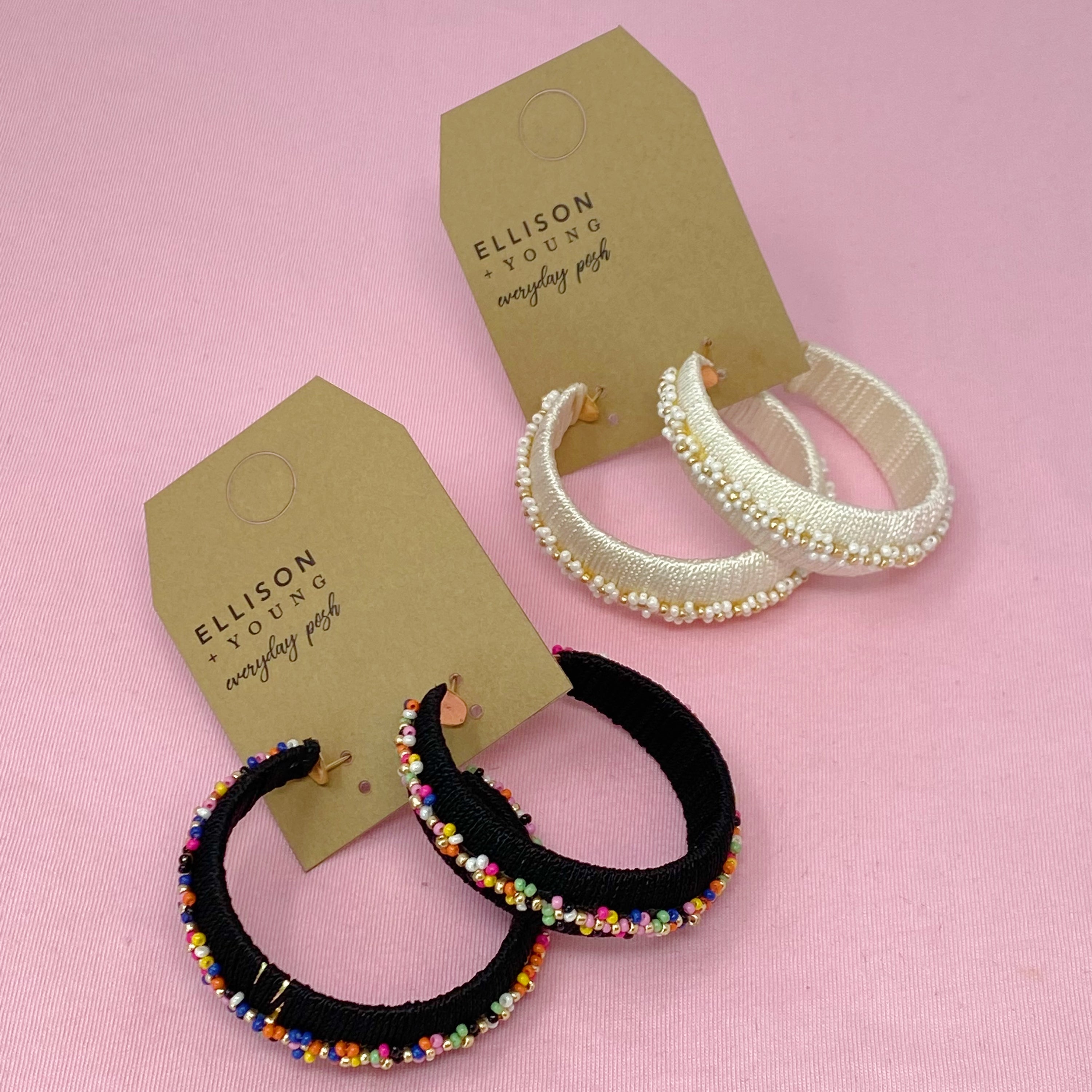 Elegant beaded hoop earrings with flower detailing, showcasing a bold yet classy design.