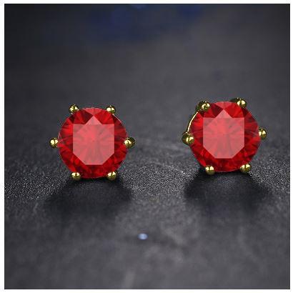 BEAM Red CZ Earrings featuring vibrant cubic zirconia in a round bezel setting, elegantly displayed in a five-pack.