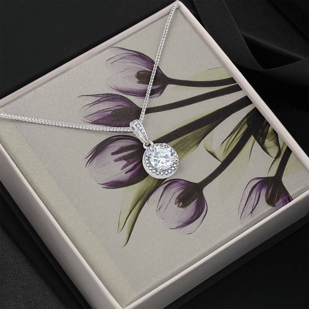 Beautiful Stone Eternal Hope Necklace featuring a cushion cut cubic zirconia and accent CZ crystals, elegantly displayed in a soft touch box.