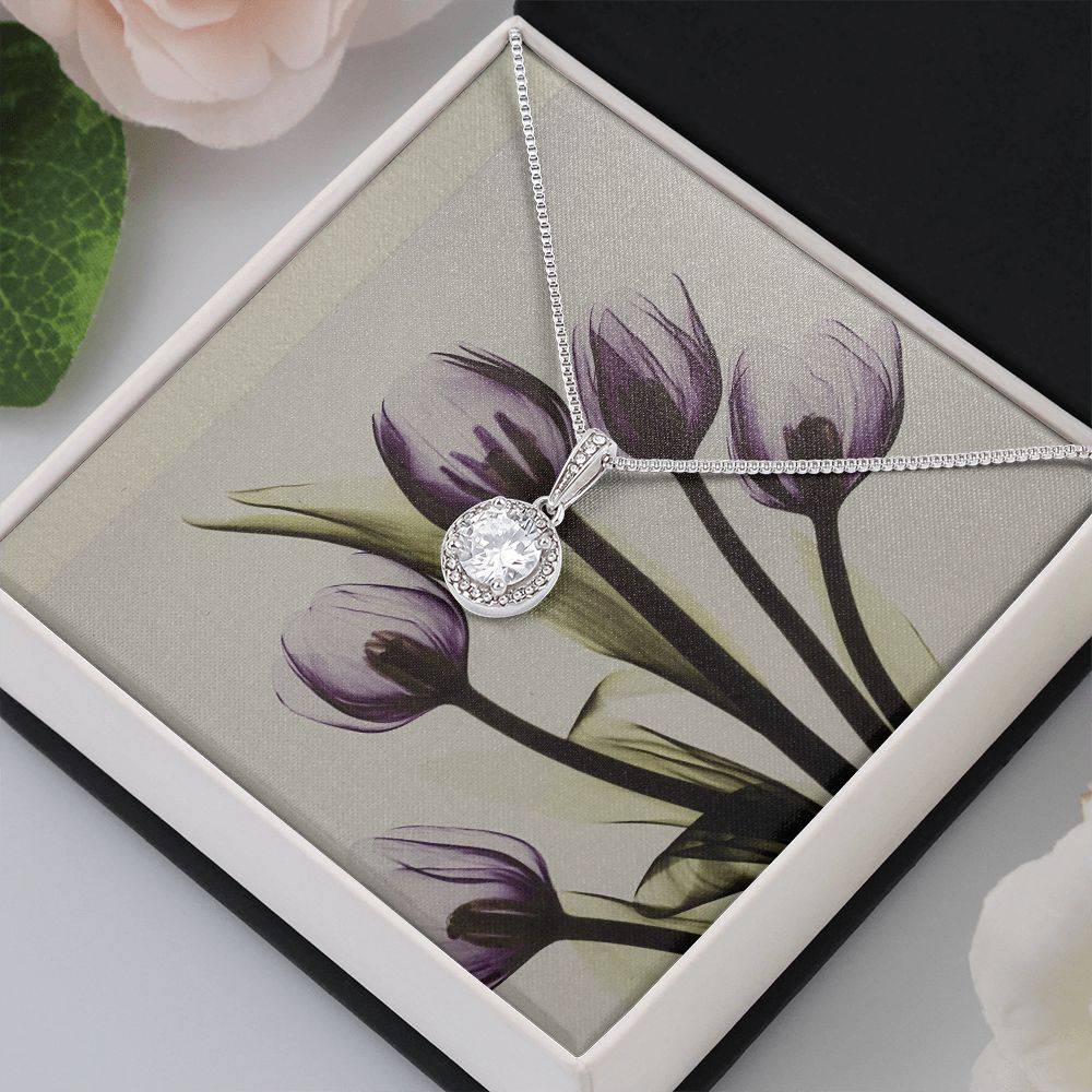 Beautiful Stone Eternal Hope Necklace featuring a cushion cut cubic zirconia and accent CZ crystals, elegantly displayed in a soft touch box.