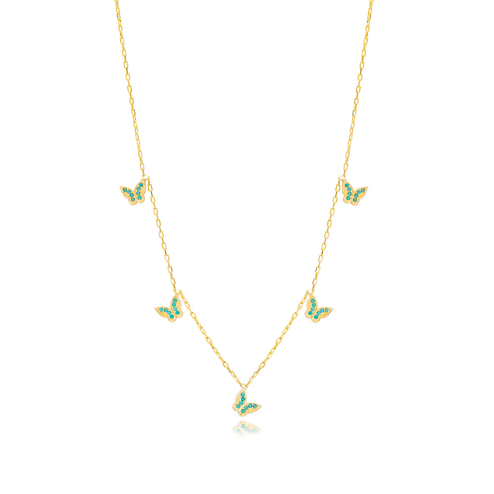 BECCA Butterfly Necklace made of 925 sterling silver with gold plating, featuring an intricate butterfly design.