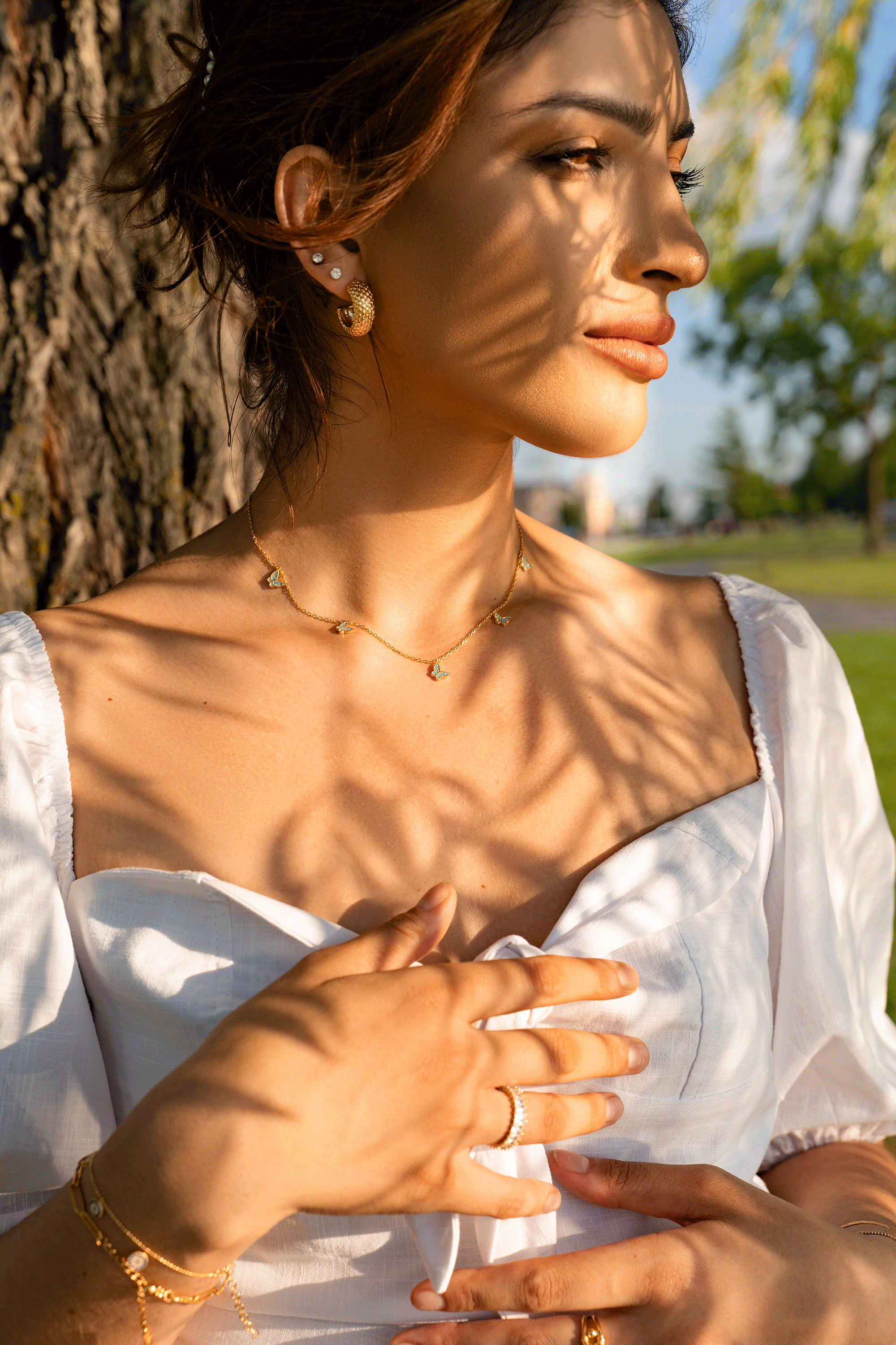 BECCA Butterfly Necklace made of 925 sterling silver with gold plating, featuring an intricate butterfly design.