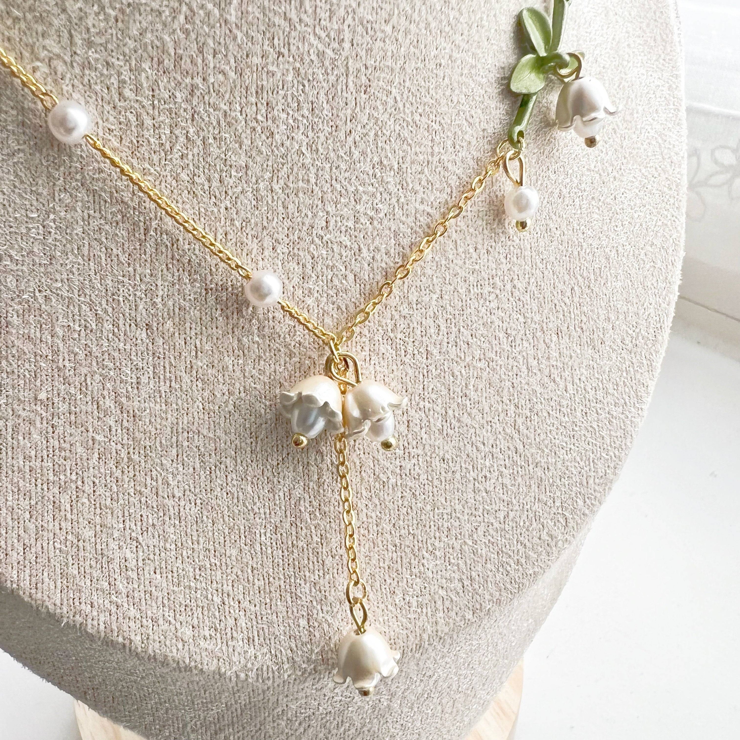 Bellflower Necklace featuring a white Campanula flower design on a gold-plated bronze chain with an artificial pearl.