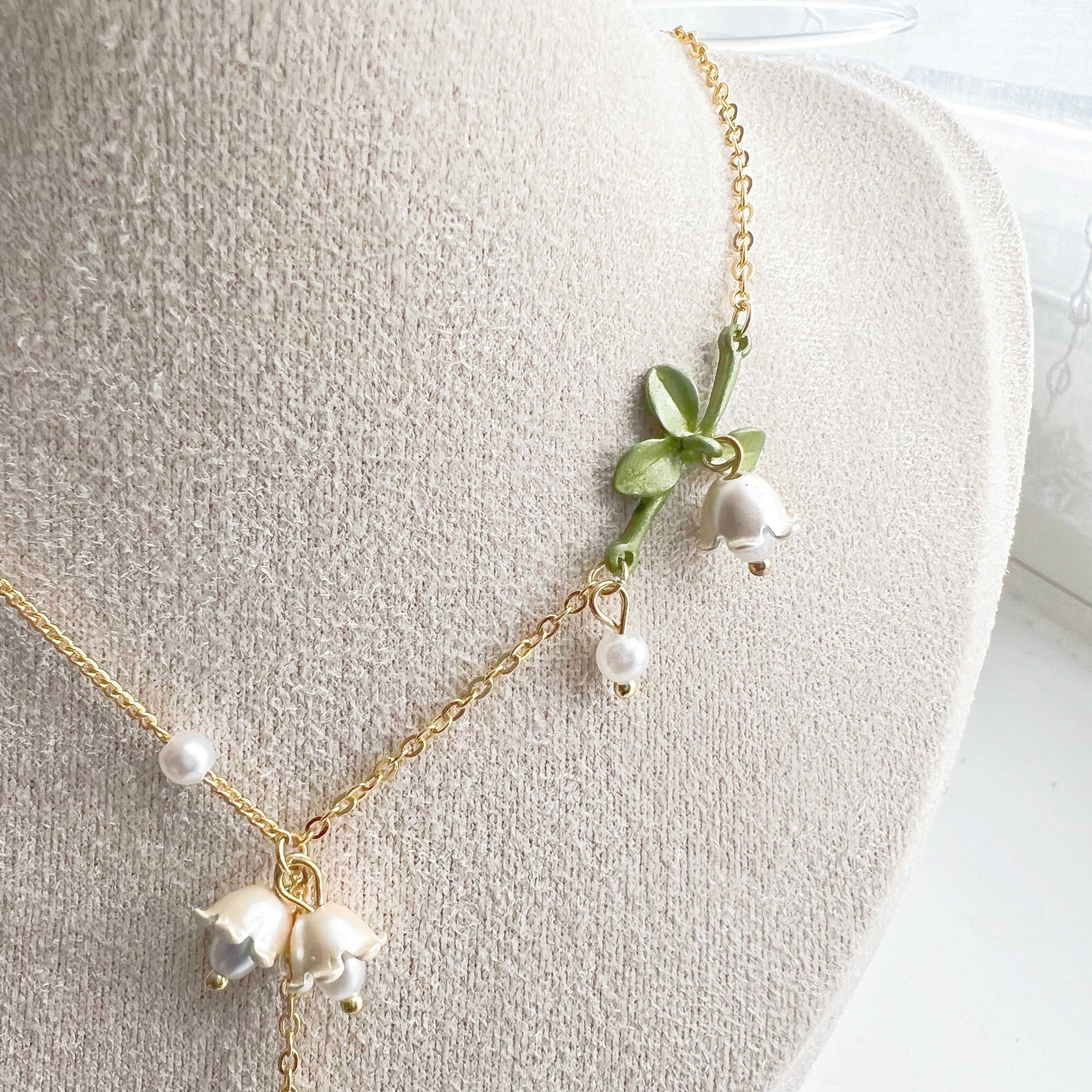 Bellflower Necklace featuring a white Campanula flower design on a gold-plated bronze chain with an artificial pearl.