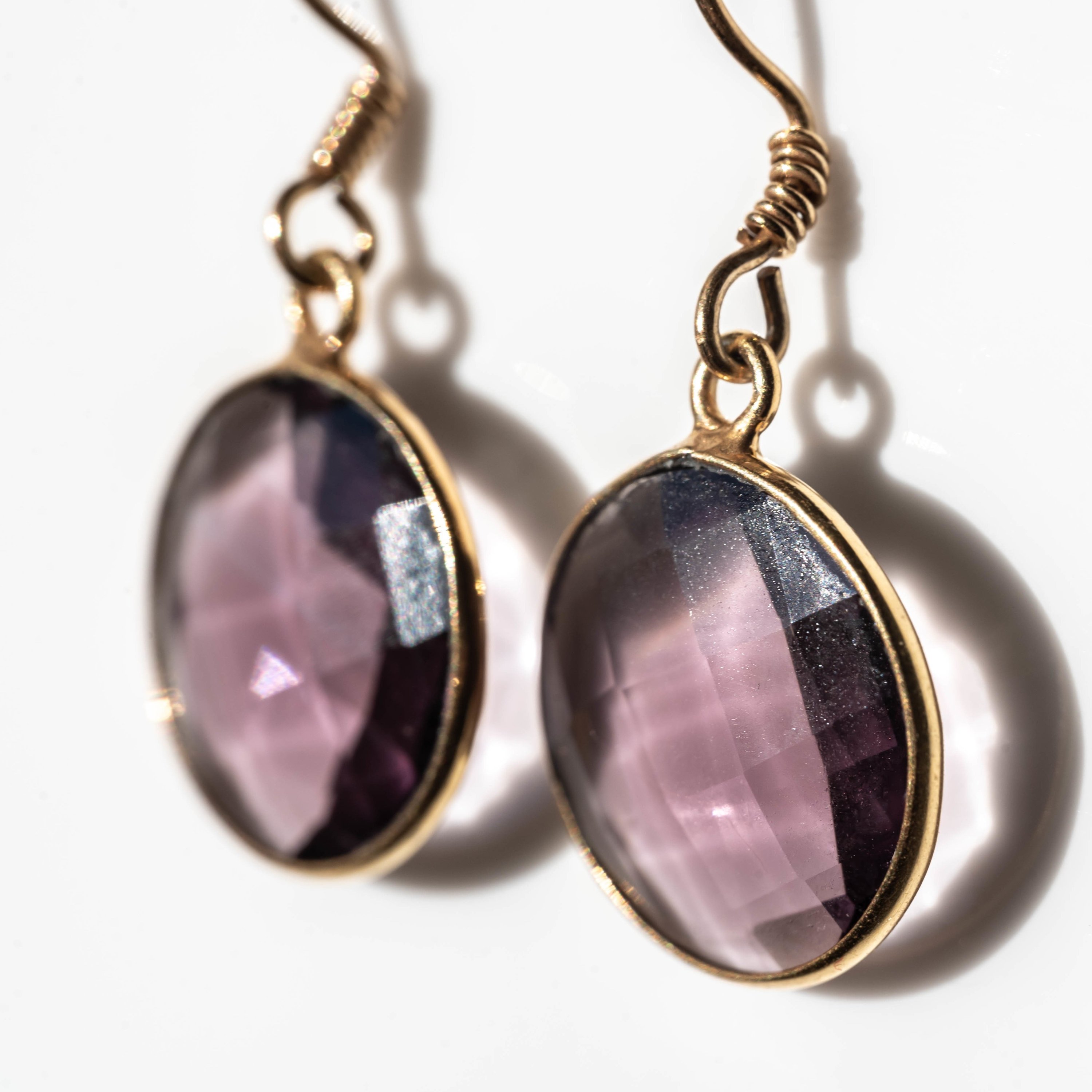 Bianca Amethyst Round Earrings featuring purple amethyst stones set in gold-plated sterling silver with 14k gold-filled ear wires.