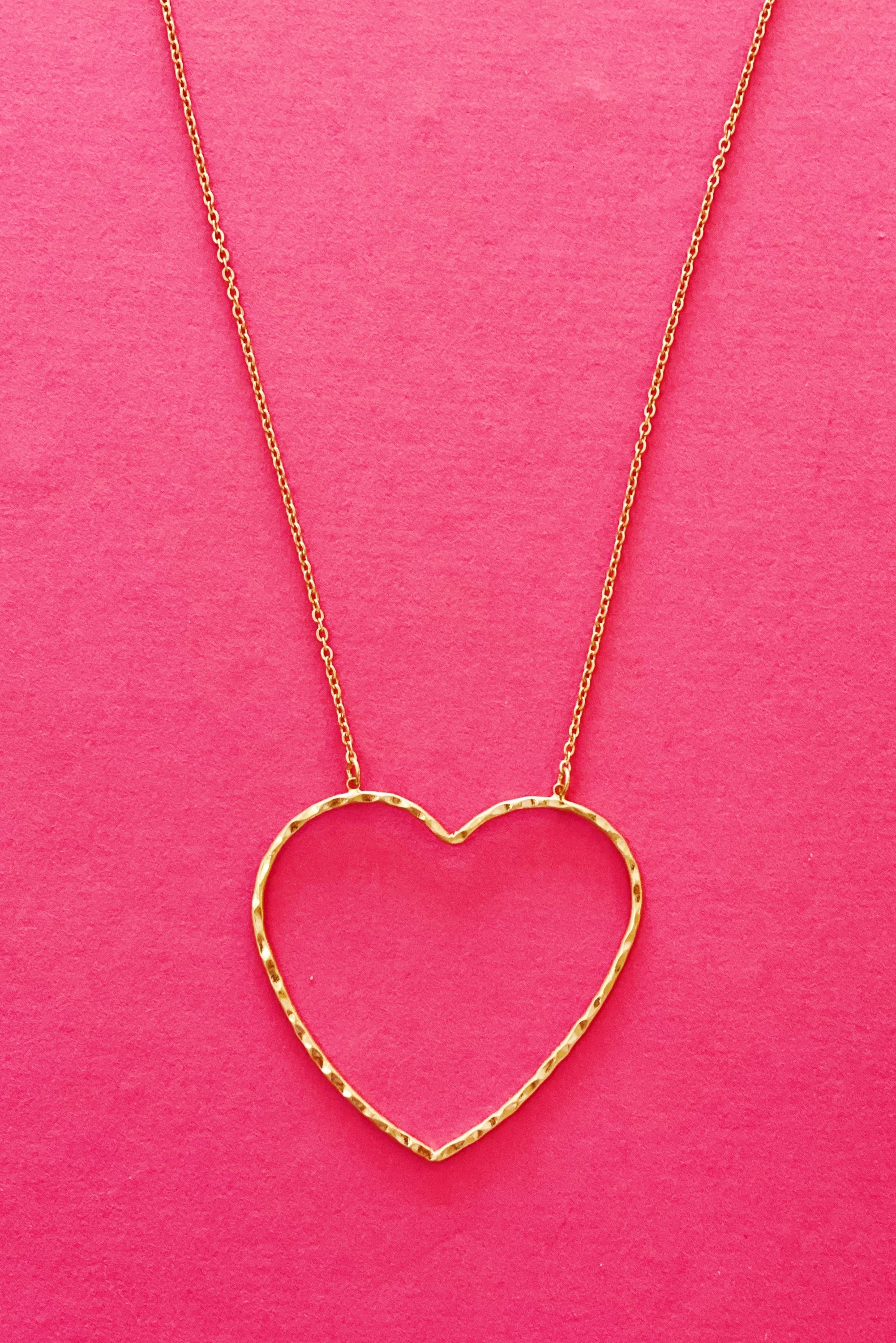 Big Heart To Love necklace featuring a hammered wire heart pendant on an adjustable chain.