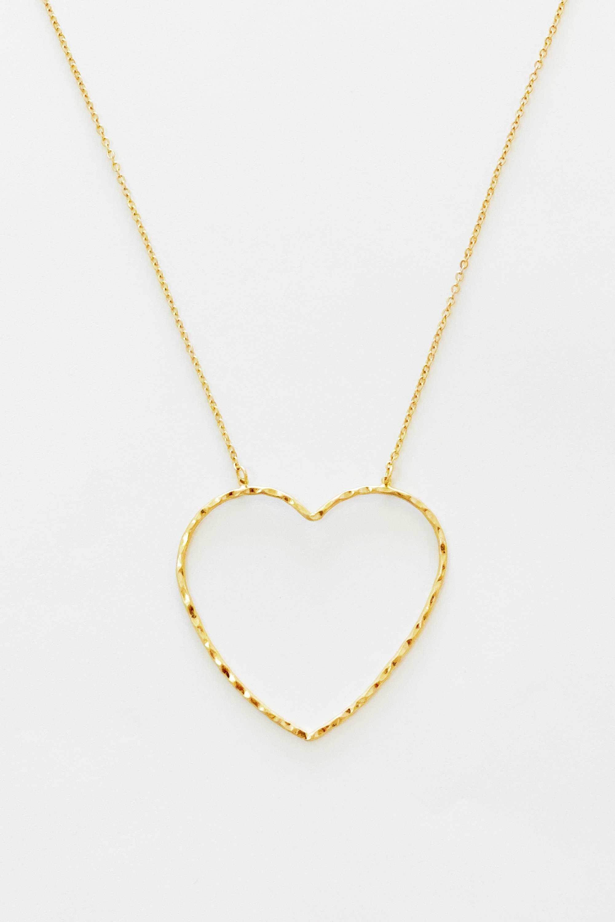 Big Heart To Love necklace featuring a hammered wire heart pendant on an adjustable chain.