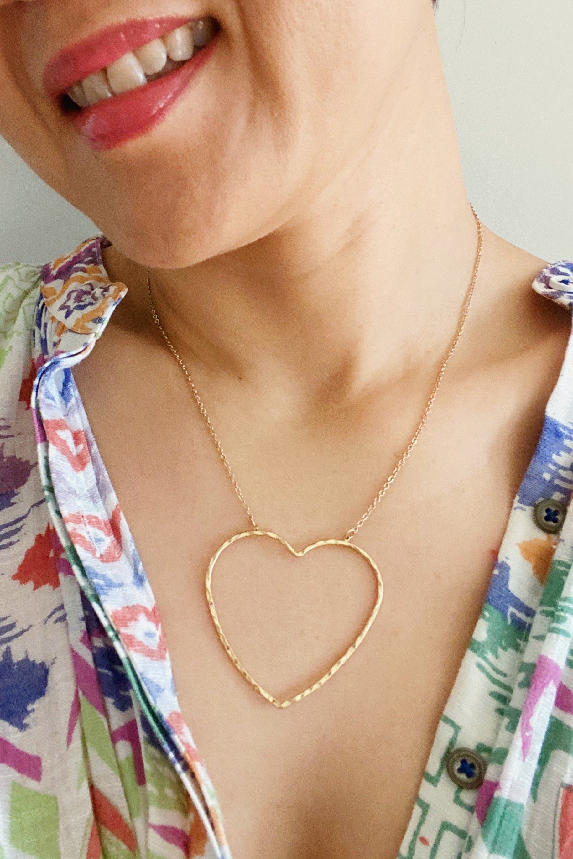 Big Heart To Love necklace featuring a hammered wire heart pendant on an adjustable chain.