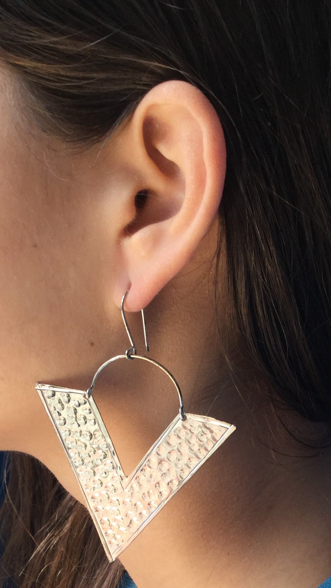 A pair of handmade Big Triangle Earrings featuring a unique geometric design, crafted from brass and silver plating, perfect for festivals and everyday wear.